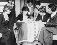 Sewing stars on suffrage flag 1920 Library of Congress Prints & Photographs Division  National Photo Company Collection Washington, D.C. Item number LC-DIG-npcc-01204 www.loc.gov/pictures